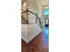 The foyer includes hardwood floors, trim and a chandelier for a bright and grand entrance at 5010 Lynnonhall Ct, Stonecrest, GA 30038