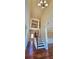 Inviting foyer showcasing hardwood floors, a staircase, and a dramatic two-story ceiling height at 5010 Lynnonhall Ct, Stonecrest, GA 30038