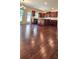 Kitchen with wooden floors and cabinets, stainless appliances, and a kitchen island at 5010 Lynnonhall Ct, Stonecrest, GA 30038