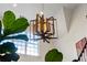 View of a modern foyer showcasing a unique light fixture and bright windows at 5360 Lake Forrest Dr, Atlanta, GA 30342