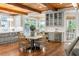 Kitchen with an open-concept eating area featuring modern light fixtures and stainless steel appliances at 5360 Lake Forrest Dr, Atlanta, GA 30342
