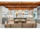 Gourmet kitchen with a large island, stainless steel appliances, and adjacent dining area at 5360 Lake Forrest Dr, Atlanta, GA 30342