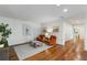 Cozy living room with hardwood floors, comfortable seating, and stylish decor at 5360 Lake Forrest Dr, Atlanta, GA 30342