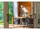 Outdoor dining area featuring table and chairs and access to green space at 5360 Lake Forrest Dr, Atlanta, GA 30342