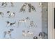 Close-up of the dog-themed wallpaper featuring hand drawn dog breeds with a blue tint at 5360 Lake Forrest Dr, Atlanta, GA 30342