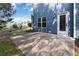 Outdoor patio with blue siding, an awning, green grass and view of a fenced backyard, excellent for relaxation at 700 Ridgeway Ct, Canton, GA 30114