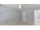 Neutral bedroom with carpet, white trim, vaulted ceiling, and a door at 2175 Charleston Oak Cir, Lawrenceville, GA 30043
