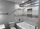 Elegant bathroom with a tub, tiled walls, rainfall shower head, and modern fixtures at 2298 Hillbriar Dr, Buford, GA 30518