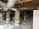 Clean crawl space with vapor barrier and insulated ductwork, ensuring a dry and energy-efficient environment at 2298 Hillbriar Dr, Buford, GA 30518