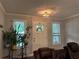 Inviting living room with a cozy atmosphere, featuring comfortable seating and natural light at 2298 Hillbriar Dr, Buford, GA 30518
