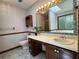 Bathroom featuring a large mirror, vanity with storage, and a separate shower at 3436 Finglas Dr, Marietta, GA 30008