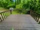 Spacious wooden deck overlooking a private, wooded backyard at 4504 Cedar Ridge Trl, Stone Mountain, GA 30083