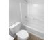 Full bathroom featuring a shower-tub combo and a white toilet at 4504 Cedar Ridge Trl, Stone Mountain, GA 30083