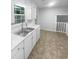 Open kitchen featuring white countertops and cabinetry at 4504 Cedar Ridge Trl, Stone Mountain, GA 30083