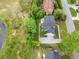 Stunning aerial view of a home with lush green landscaping and a well-maintained lawn at 720 Belgrave Ln, Tucker, GA 30084