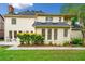 Spacious backyard with lush greenery and a charming patio area, perfect for outdoor entertaining at 720 Belgrave Ln, Tucker, GA 30084