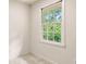 Bright bedroom with a large window providing natural light at 720 Belgrave Ln, Tucker, GA 30084