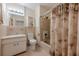 Neutral bathroom featuring a toilet, bathtub/shower, and sink with vanity at 2133 Bird Ln, Snellville, GA 30078