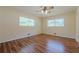 Airy bedroom enhanced by abundant natural light and appealing flooring at 2133 Bird Ln, Snellville, GA 30078