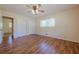Bedroom featuring hardwood flooring, a closet, and a window at 2133 Bird Ln, Snellville, GA 30078