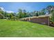 Well-maintained brick home with a spacious front yard and a basketball hoop, offering curb appeal at 2133 Bird Ln, Snellville, GA 30078