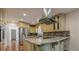 Gourmet kitchen featuring stainless steel appliances, granite counters, and ample cabinet space at 2133 Bird Ln, Snellville, GA 30078