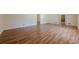 Elegant living room showcasing hardwood floors, seamlessly connecting to other areas of the home for easy flow at 2133 Bird Ln, Snellville, GA 30078