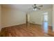 Bright living room with wood floors, neutral walls, and an open floor plan great for entertaining at 2133 Bird Ln, Snellville, GA 30078
