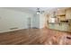 Spacious living room with wood floors, a ceiling fan, and neutral paint perfect for relaxing at 2133 Bird Ln, Snellville, GA 30078