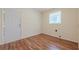 Spacious mud room features wood-look floors, a window, and an exterior door at 2133 Bird Ln, Snellville, GA 30078