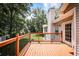 Wooden deck with railing and backyard views at 239 Clear Brook Trl, Douglasville, GA 30134
