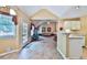 Open dining area with backyard access and view of living room at 239 Clear Brook Trl, Douglasville, GA 30134