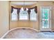 Cozy dining area with large windows providing natural light at 239 Clear Brook Trl, Douglasville, GA 30134