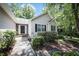 Charming single-story home with neutral siding, black shutters, and a stone accent entryway at 239 Clear Brook Trl, Douglasville, GA 30134