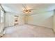 Open living room with paneled ceilings that has access to the kitchen with lots of potential at 239 Clear Brook Trl, Douglasville, GA 30134