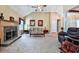Spacious living room with vaulted ceiling, stone fireplace, and ceiling fan at 239 Clear Brook Trl, Douglasville, GA 30134