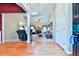 Inviting living area with wood floors, high ceilings, and a cozy fireplace feature at 239 Clear Brook Trl, Douglasville, GA 30134