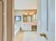 Bright bathroom with a soaking tub, single vanity, and white cabinets at 239 Clear Brook Trl, Douglasville, GA 30134