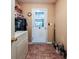 Functional mud room features tile flooring and access to the exterior at 239 Clear Brook Trl, Douglasville, GA 30134