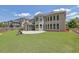Expansive backyard offers ample room, features a screened porch and a basketball hoop at 4100 Secret Shoals Way, Buford, GA 30518