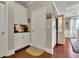 Cozy kitchen nook with white cabinets, granite countertops, and stainless steel appliances at 4100 Secret Shoals Way, Buford, GA 30518