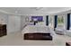 Inviting main bedroom featuring neutral colors, a king-sized bed with storage, and natural light at 4100 Secret Shoals Way, Buford, GA 30518