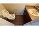 Bathroom with tile floors, a single sink vanity, and a standard toilet at 4649 Camelot Dr, Douglasville, GA 30135