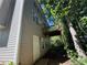 Rear view of a home with a private deck and siding at 4649 Camelot Dr, Douglasville, GA 30135