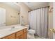 Bathroom featuring a vanity with cabinet storage, and a shower with a curtain at 537 Autumn Ridge Dr, Canton, GA 30115