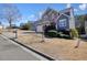 Charming two-story home with a well-manicured lawn and inviting curb appeal in a suburban neighborhood at 537 Autumn Ridge Dr, Canton, GA 30115