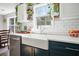 Modern farmhouse style kitchen with white countertops, subway tile, and stainless appliances at 537 Autumn Ridge Dr, Canton, GA 30115