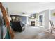 Bright living room featuring a fireplace, comfortable seating, and stylish decorations at 537 Autumn Ridge Dr, Canton, GA 30115