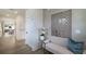 Inviting hallway with wood floors, white trim, and decorative wall art at 1846 Butterfly Way, Marietta, GA 30066