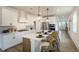 Modern kitchen with a large center island, white cabinets, and stainless steel appliances at 1846 Butterfly Way, Marietta, GA 30066